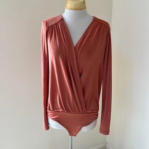 Free people Small turnt thong bodysuit.